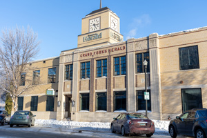 The Grand Forks Herald Building with the Grand Forks Region Economic Development Corporation entrance from North Fourth Street.