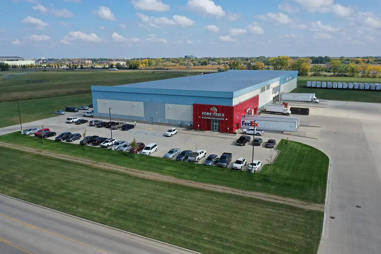 A drone shot of the Acme Tools distribution building in the Grand Forks business park.