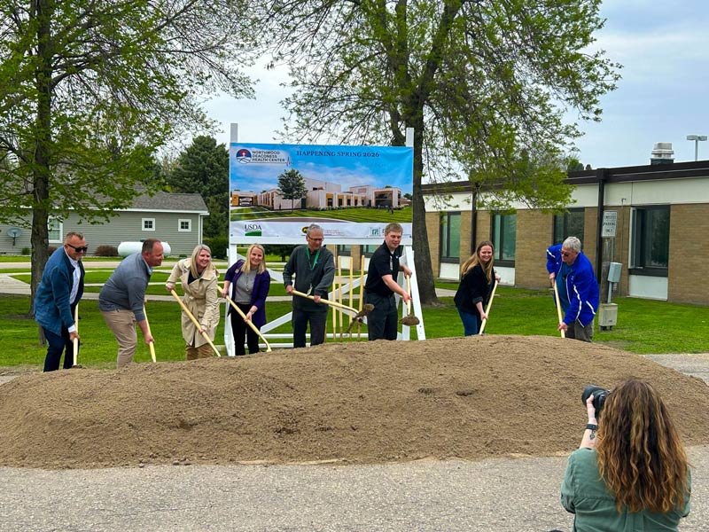 A group of Northwood Community leader stand together shoveling dirt at the Northwood Deaconess Health Center Groundbreaking on Tuesday, May 14, 2024.