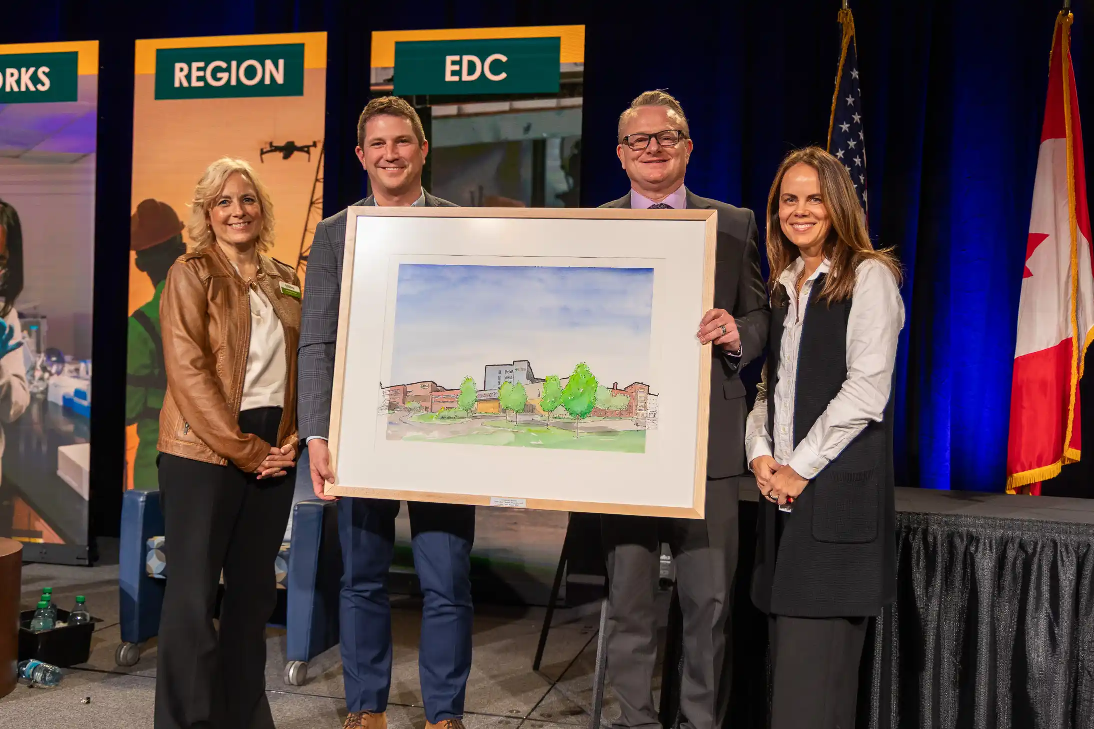 Altru Health System leaders accept the 2025 Klaus Thiessen Impact Award.