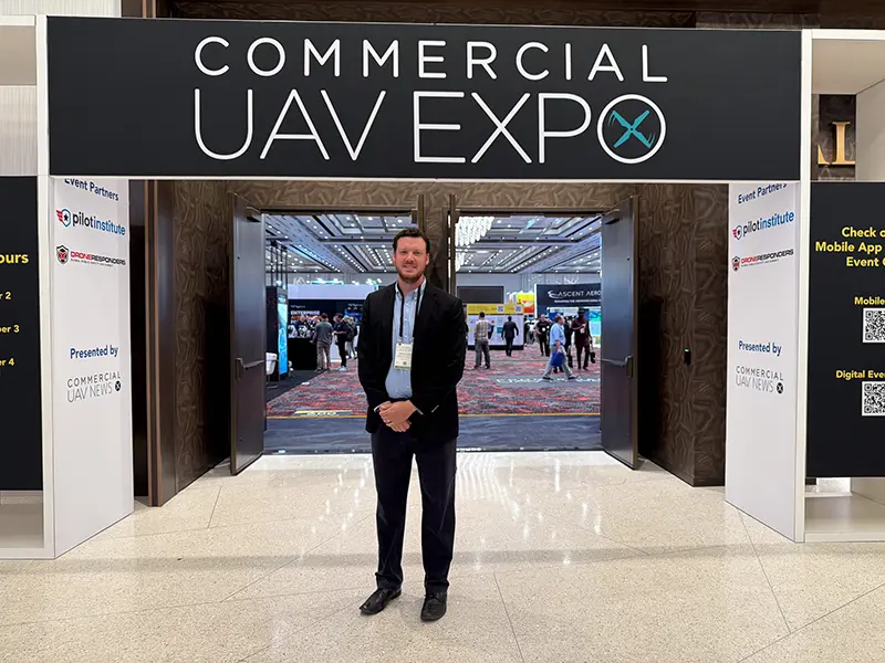 Kevin Hatcher at the entrance of the Commercial UAV Expo.