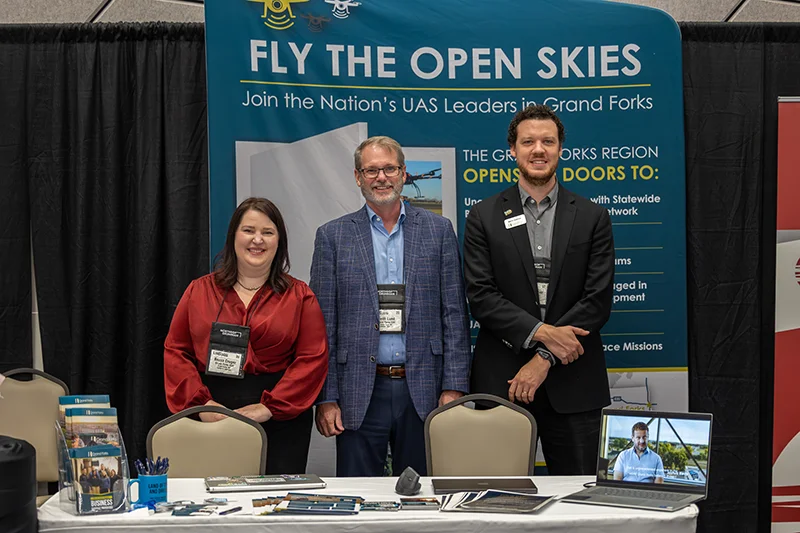 Becca Cruger (left), Keith Lund (middle), and Kevin Hatcher (right), at the UAS Summit.