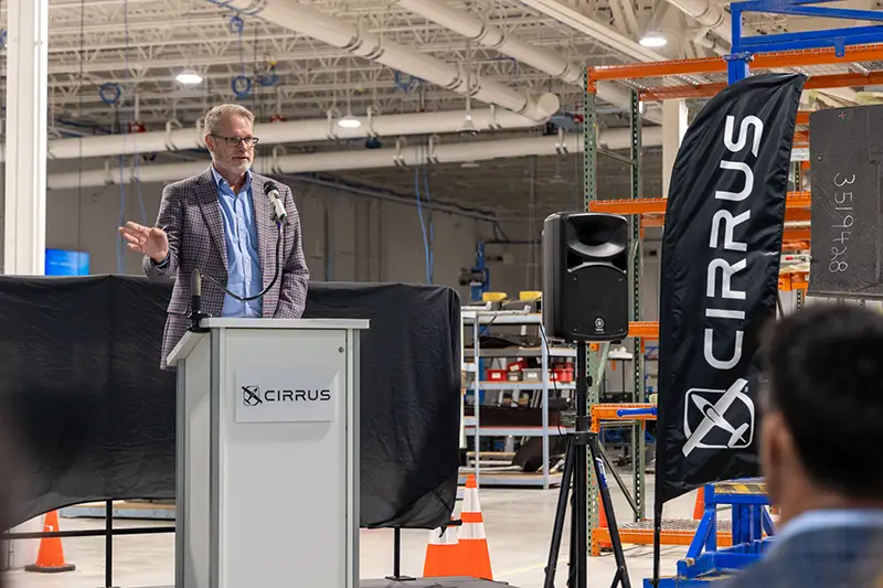 Keith Lund delivers remarks at the Cirrus Aircraft ribbon-cutting.