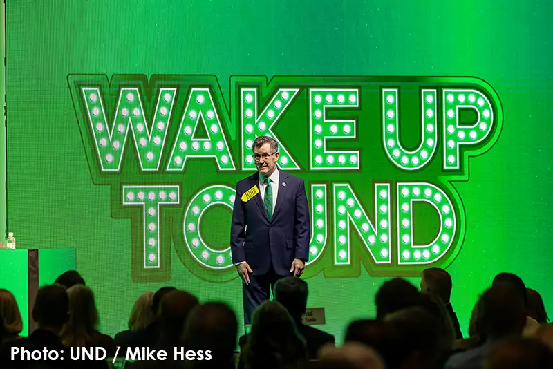 UND President Andy Armacost addresses the crowd at the University’s annual “Wake Up to UND” event.