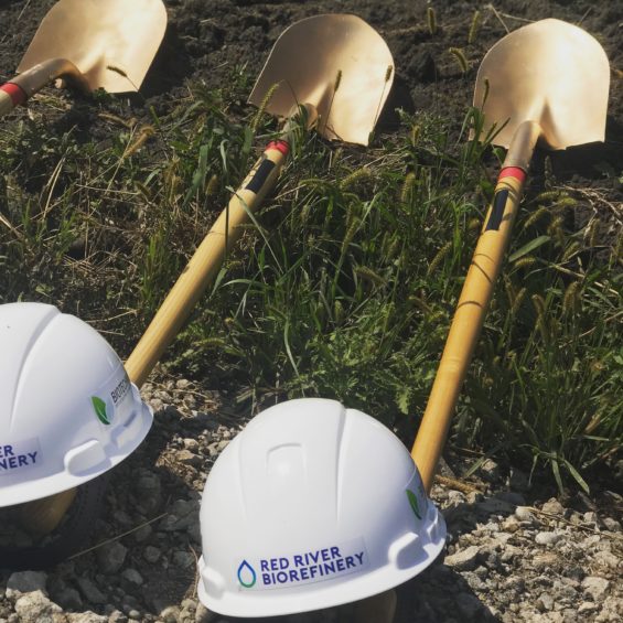 Hard hats and shovels laying on the ground in Grand Forks