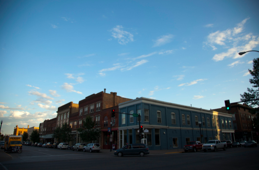 A street corner in downtown Grand Forks at sunset