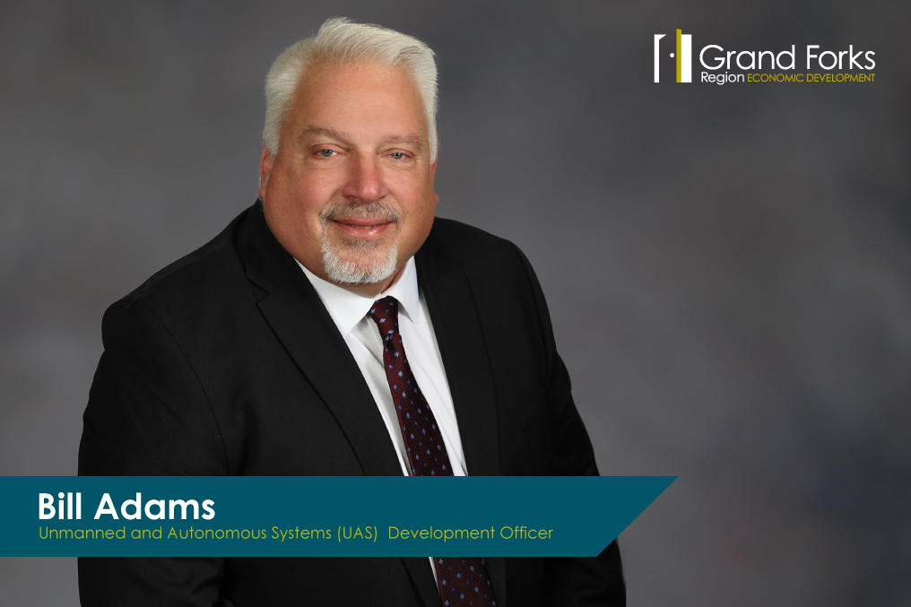 Bill Adams headshot with the words "Bill Adams, Unmanned and Autonomous Systems (UAS) Development Officer" and the Grand Forks Region EDC logo